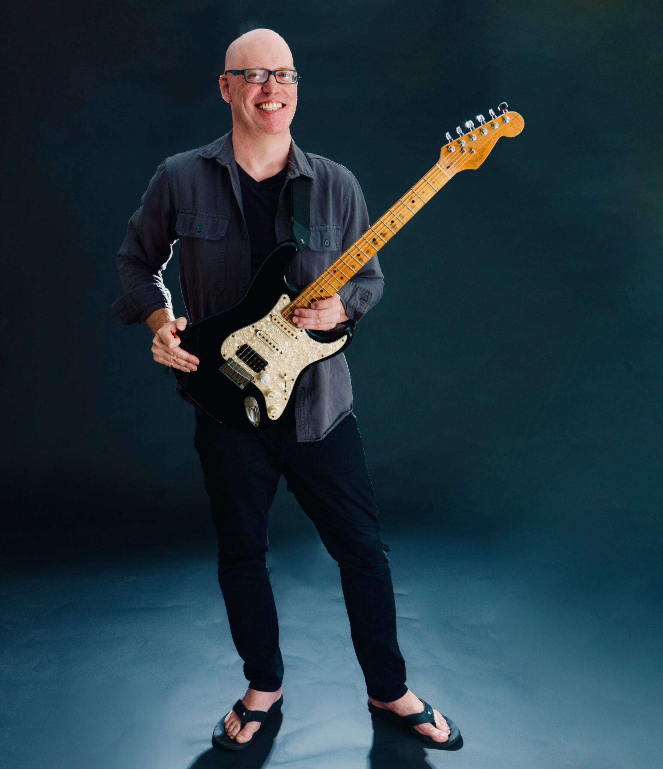 Guitar Instructor Steve Langemo With Electric Guitar